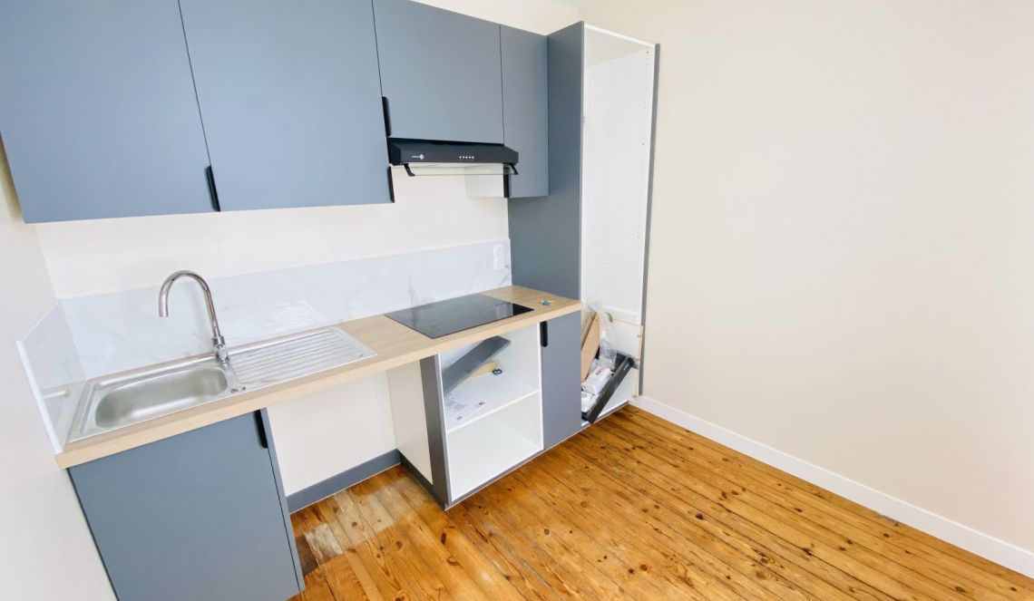Appartement ancien avec cuisine indépendante 